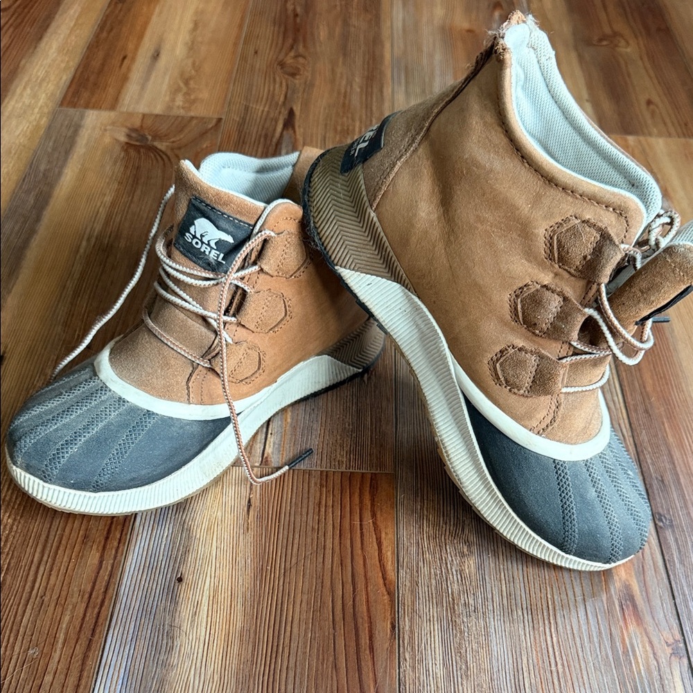 Sorel Woman’s Tan and Brown Waterproof Lace-Up Out and About Boots